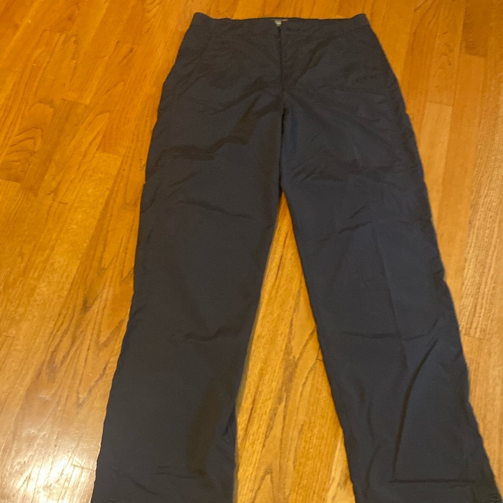 Black nylon pants for hiking, canoeing/kayaking. Adjustable waist and ankles.